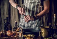 Gotowanie na patelni z użyciem różnych olejów w rustykalnej kuchni
